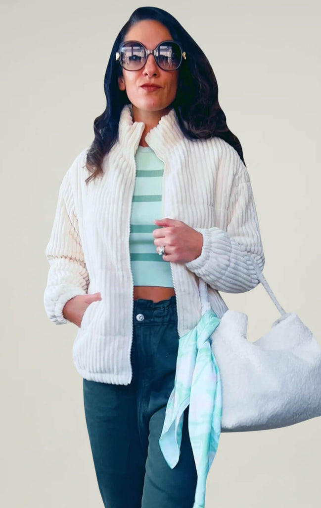 A women wearing white jacket